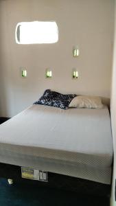 Posteľ alebo postele v izbe v ubytovaní hostel Lobeira