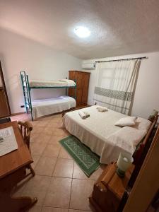 Voodi või voodid majutusasutuse Agriturismo Su Barraccu toas