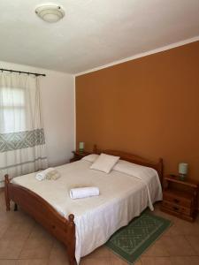 Letto o letti in una camera di Agriturismo Su Barraccu