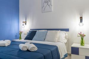 Postel nebo postele na pokoji v ubytování B&B Domus Magma