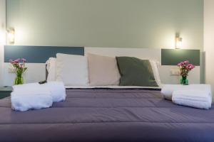 Postel nebo postele na pokoji v ubytování B&B Domus Magma