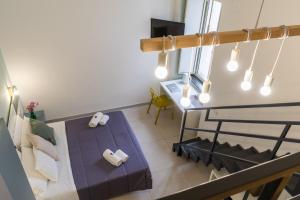 Postel nebo postele na pokoji v ubytování B&B Domus Magma