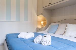 Postel nebo postele na pokoji v ubytování B&B Domus Magma