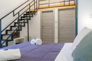 Postel nebo postele na pokoji v ubytování B&B Domus Magma