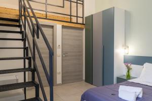 Postel nebo postele na pokoji v ubytování B&B Domus Magma