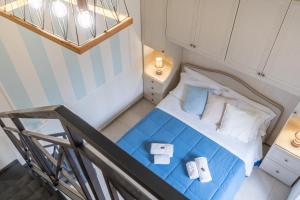 Postel nebo postele na pokoji v ubytování B&B Domus Magma