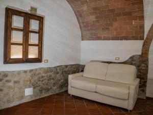 Predel za sedenje v nastanitvi Podere Mona
