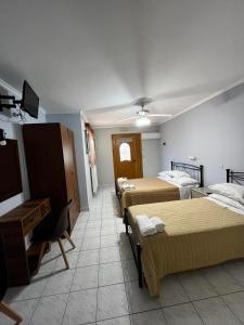 Postel nebo postele na pokoji v ubytování Nikos Studios and Apartments