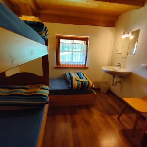 Postel nebo postele na pokoji v ubytování Rifugio Stella Alpina Spiz Piaz per escursionisti