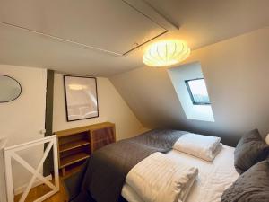 מיטה או מיטות בחדר ב-Large 5 Bedroom Flat in Lovely Urban Area in CPH Ø