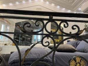 Llit o llits en una habitació de Palace de Luxe