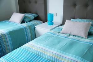 Posteľ alebo postele v izbe v ubytovaní 2143-Lovely 2 bedrooms newly furnished