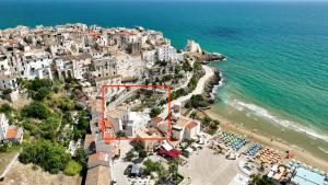 an aerial view of a beach with buildings and the ocean at Palazzo San Rocco Residenza Gentilizia in Sperlonga