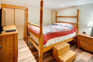 a bedroom with a bunk bed and a desk at Ketchikan Apt - Walk to Refuge Cove Beach! in Ketchikan