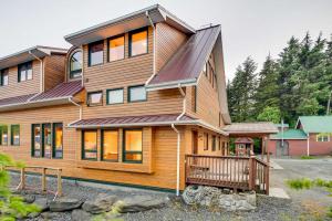 a wooden house with a gambrel roof at Ketchikan Apt - Walk to Refuge Cove Beach! in Ketchikan
