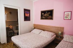 Postel nebo postele na pokoji v ubytování B&B Pisaland