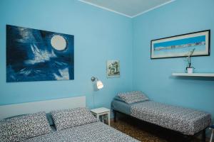 Postel nebo postele na pokoji v ubytování B&B Pisaland