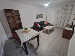 Posedenie v ubytovaní Apartamento Acogedor en Los Patios De San Basilio