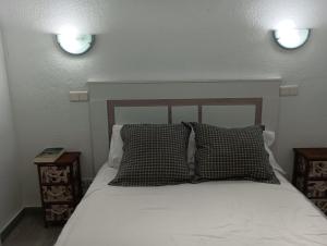 Postel nebo postele na pokoji v ubytování Urbanizacion el Palmar + 27 fotografií