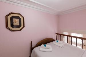 Un pat sau paturi într-o cameră la Jauregi - baskeyrentals