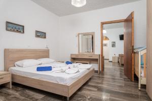 Ein Bett oder Betten in einem Zimmer der Unterkunft Studios Limnionas