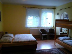 Letto o letti in una camera di Penzion Adam - Makov