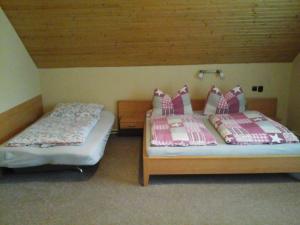 Letto o letti in una camera di Penzion Adam - Makov