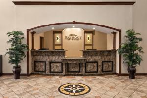 an entrance to a store with a large mirror at Baymont by Wyndham Wichita Falls in Wichita Falls