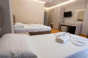 Postel nebo postele na pokoji v ubytování Hotel Miami Beach
