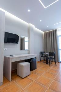 TV a/nebo společenská místnost v ubytování Hotel Miami Beach