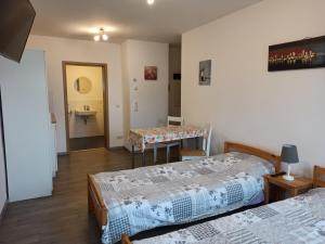 Postel nebo postele na pokoji v ubytování Gästewohnung Fischer