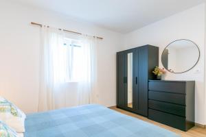 Un ou plusieurs lits dans un hébergement de l'établissement Apartment near the beach- Zen 2