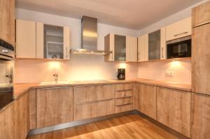 Kuchnia lub aneks kuchenny w obiekcie Alpin & Seeresort Top 10 - by Alpen Apartments