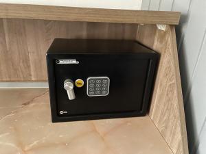 a black box with a remote control in a drawer at Studio Rm Vâlcea in Râmnicu Vâlcea