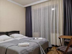 Postel nebo postele na pokoji v ubytování UP Holiday Home