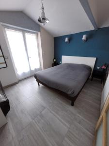 Posteľ alebo postele v izbe v ubytovaní Beau chalet 6 personnes avec Jacuzzi