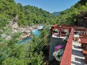 a view of a river from a bridge at Hostel Raft Neretva in Konjic
