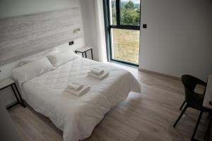 Posteľ alebo postele v izbe v ubytovaní Hotel Chips Fene