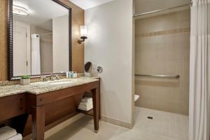 a bathroom with a sink and a shower at JW Marriott San Antonio Hill Country Resort & Spa in San Antonio