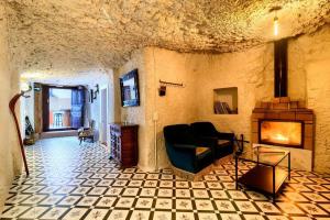 Posezení v ubytování Cueva con jacuzzi a 20 minutos de Valencia