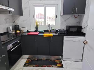 Kuchyň nebo kuchyňský kout v ubytování Relax House Barcelone