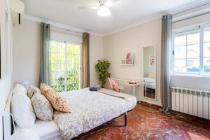 A bed or beds in a room at Casa la Fontana - Hostatel