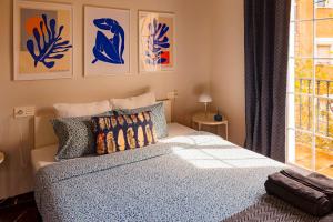 A bed or beds in a room at Casa la Fontana - Hostatel