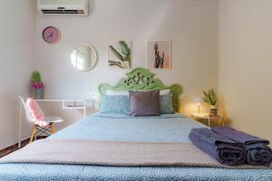 A bed or beds in a room at Casa la Fontana - Hostatel
