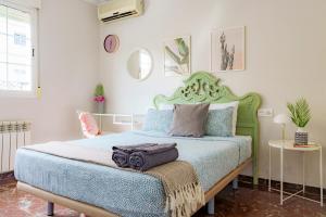 A bed or beds in a room at Casa la Fontana - Hostatel