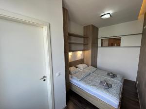 Ένα ή περισσότερα κρεβάτια σε δωμάτιο στο B38 Apartment