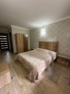 Voodi või voodid majutusasutuse Sochiner Hotel toas