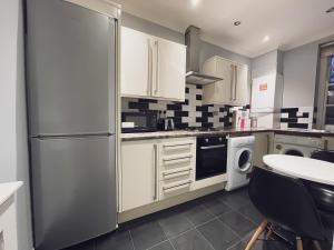 A kitchen or kitchenette at Double Room with private bathroom in a Shared flat in ZONE 1 !!!