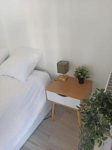 En eller flere senge i et værelse på Centre ville, Parking, transport en commun au pied de l'immeuble