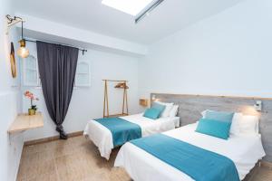 Postel nebo postele na pokoji v ubytování Casa Volcán y Mar